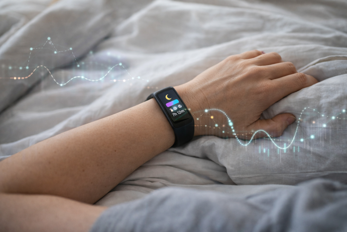 fitness tracker displaying sleep data with overlaid graph showing sleep stage patterns throughout night