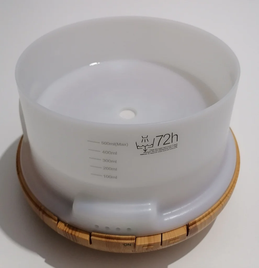 asakuki diffuser tank open showing 500ml capacity markings and 72-hour cleaning reminder