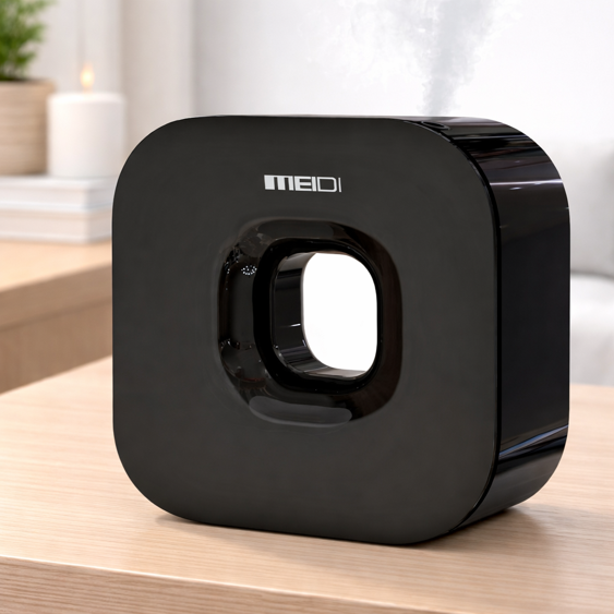 meidi waterless essential oil diffuser with distinctive square cutout design on a wooden surface