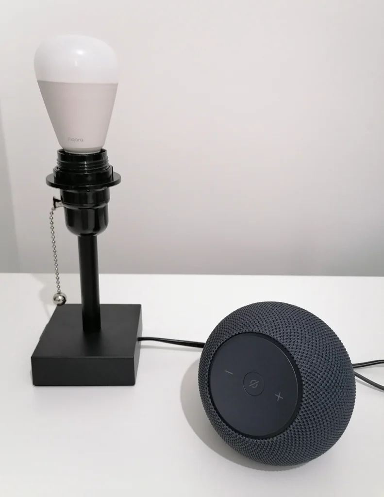 aqara t2 bulb installed in lamp alongside echo dot max thread border router