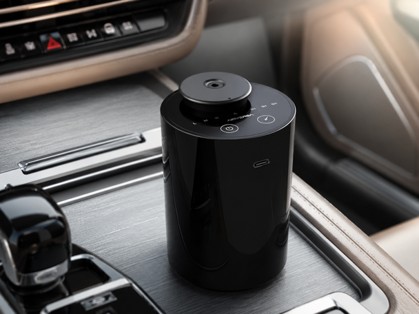 airversa scenta basic waterless car diffuser in cup holder showing mist and timer controls