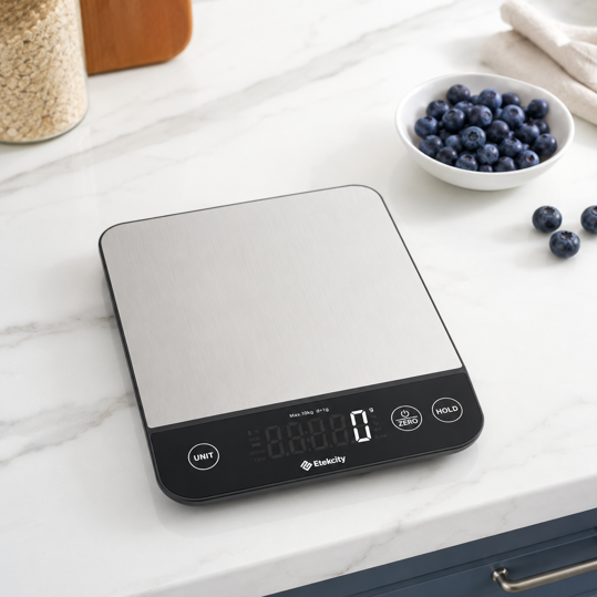 etekcity luminary smart food scale with stainless steel platform and digital display on kitchen counter